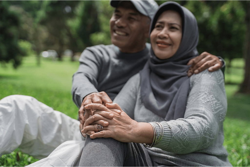 Happy couple holding hands and smiling